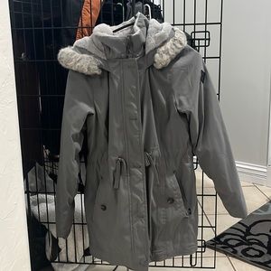 This coat has been worn maybe once, super soft on the inside.